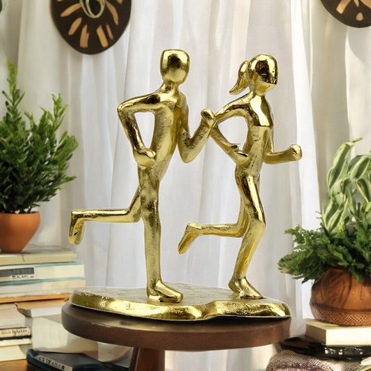 Handcrafted Golden Aluminum Couple Jogging Sculpture: Dynamic Ornament for Inspired Home Décor