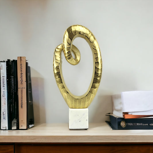 Golden Radiance: Handcrafted Aluminum Decor Object on Marble Base