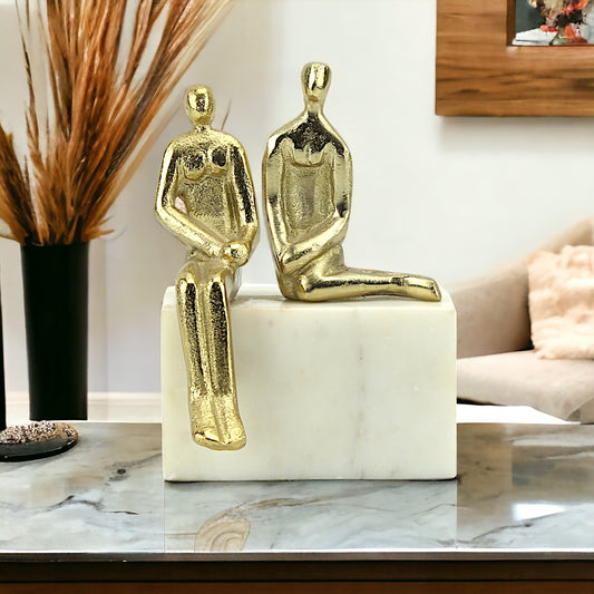 Golden Aluminum Couple Sculpture: Handcrafted Art on White Marble Block Base