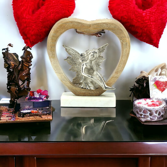 Seraphic Serenity: Handcrafted Silver Aluminium Angel Sitting in Wooden Heart on Marble Base
