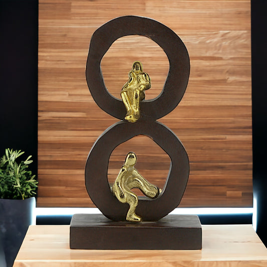 Golden Harmony: Handcrafted Aluminium Mini Human Sitting Sculpture on Wood-Designed Base