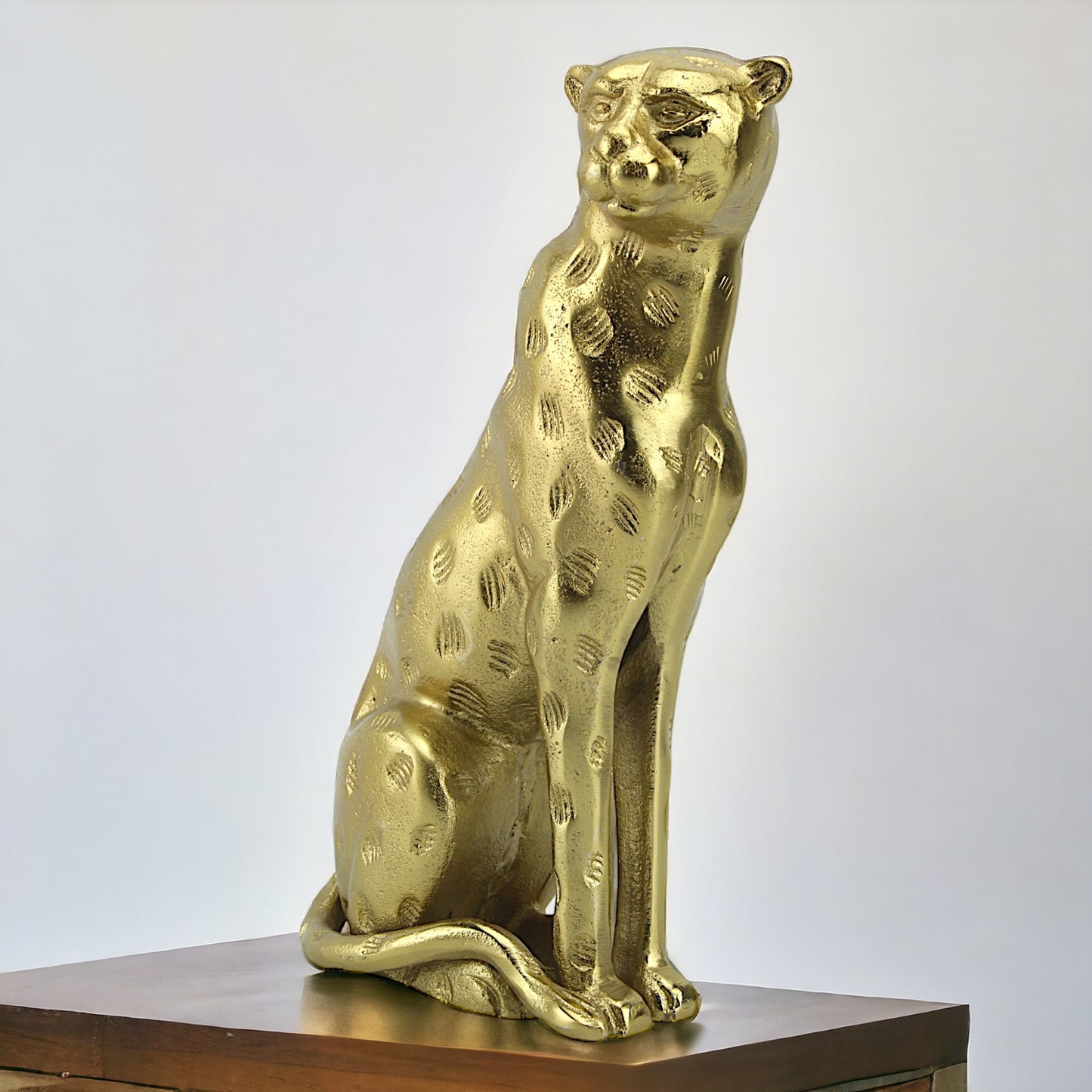 Golden Majesty: Handcrafted Aluminium Sitting Tiger Sculpture