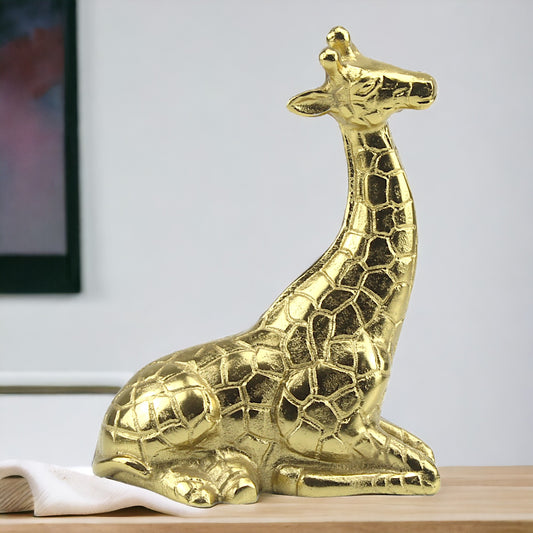 Handcrafted Golden Aluminum Seated Giraffe Decor Sculpture: Elegant Ornamental Accent
