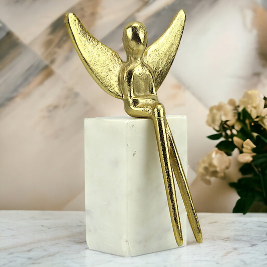 Golden Seraph: Handcrafted Aluminum Angel Sitting on Marble Rock Sculpture Decor Ornament