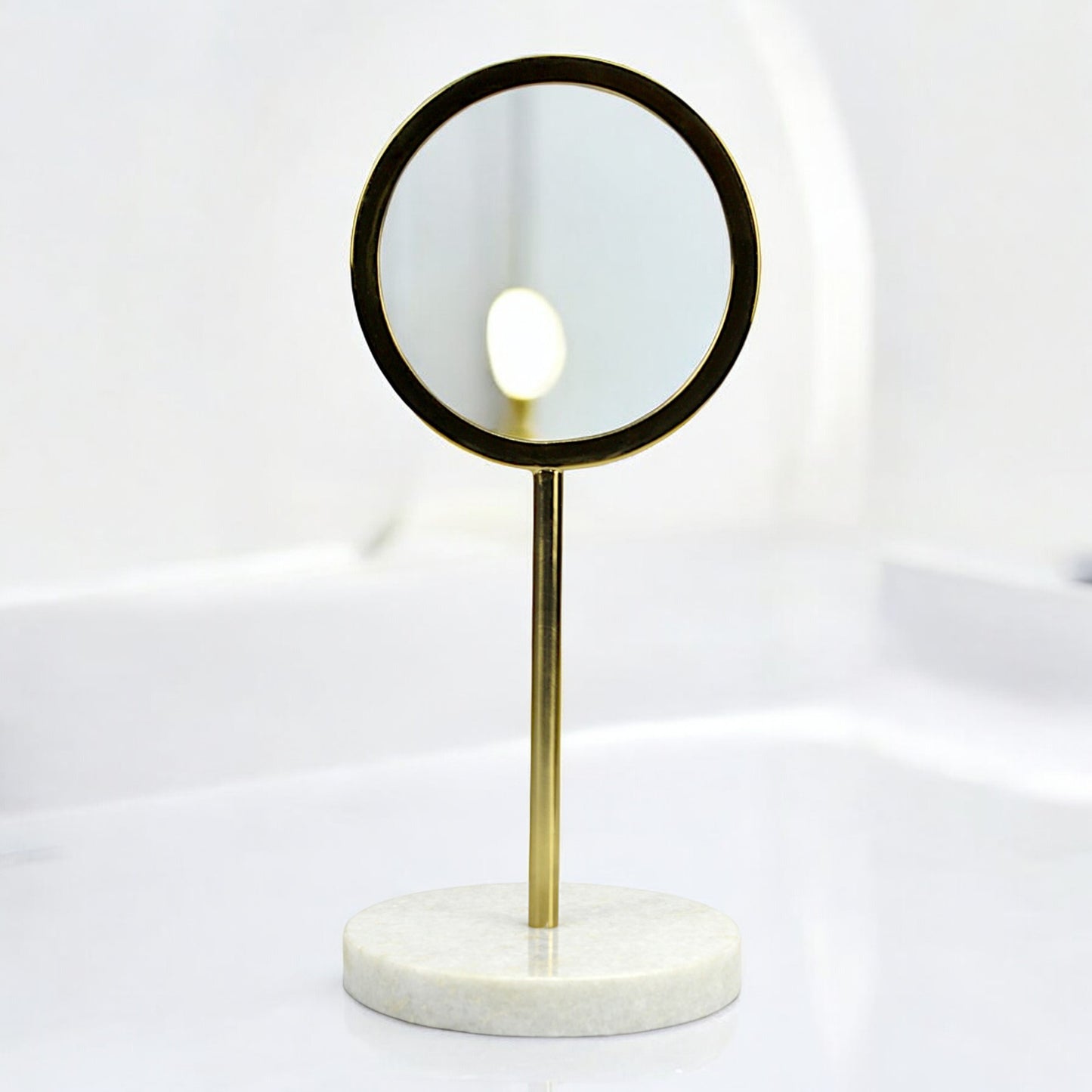 A Round Vanity Mirror on Marble Base