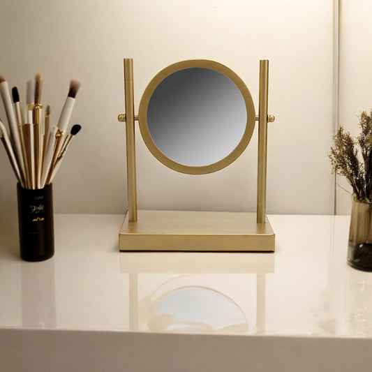 A Round Vanity Mirror in Metal Frame