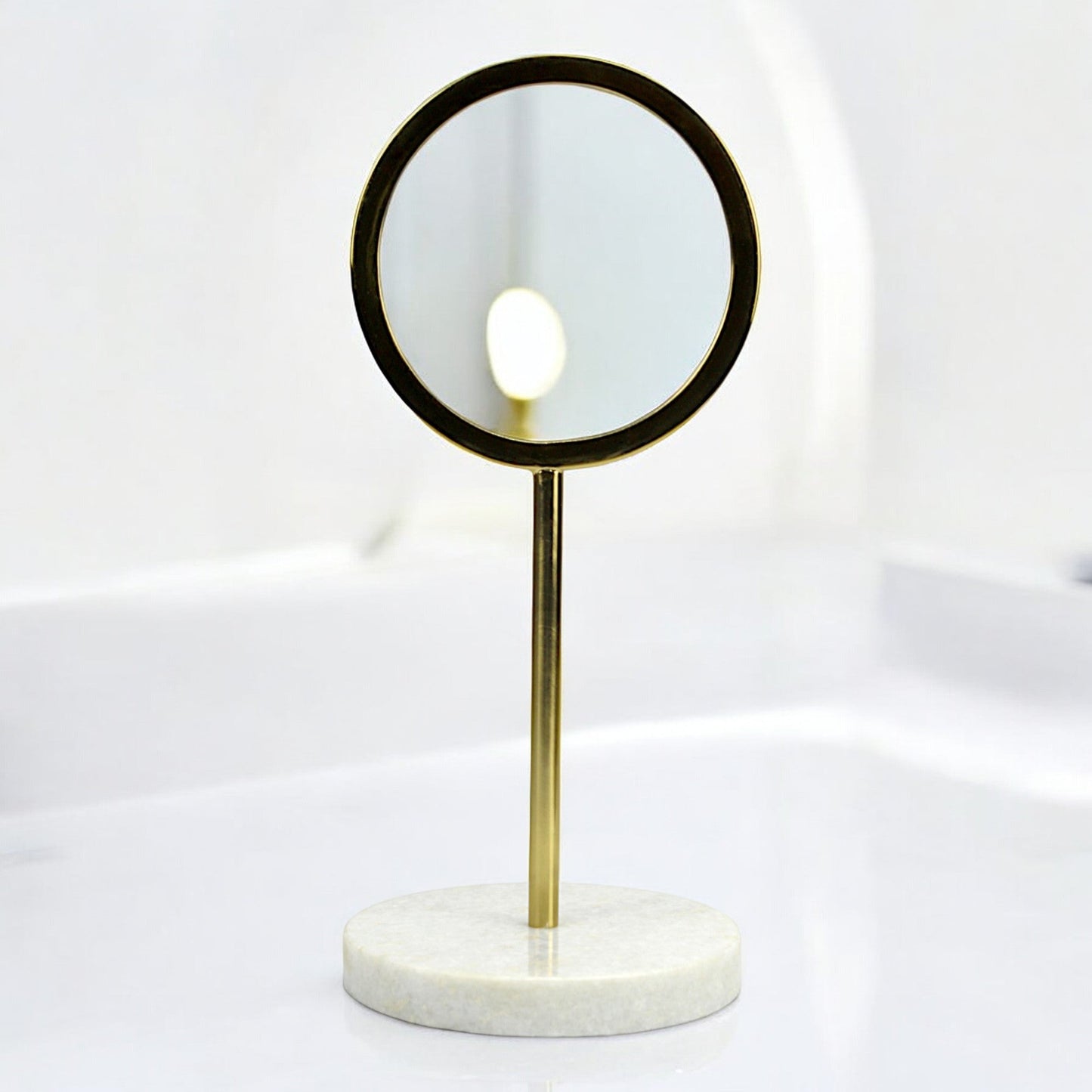 A Round Vanity Mirror on Marble Base