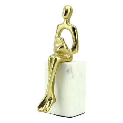 Golden Aluminum Sitting Lady Sculpture with Book: Handcrafted Elegance on White Marble Base