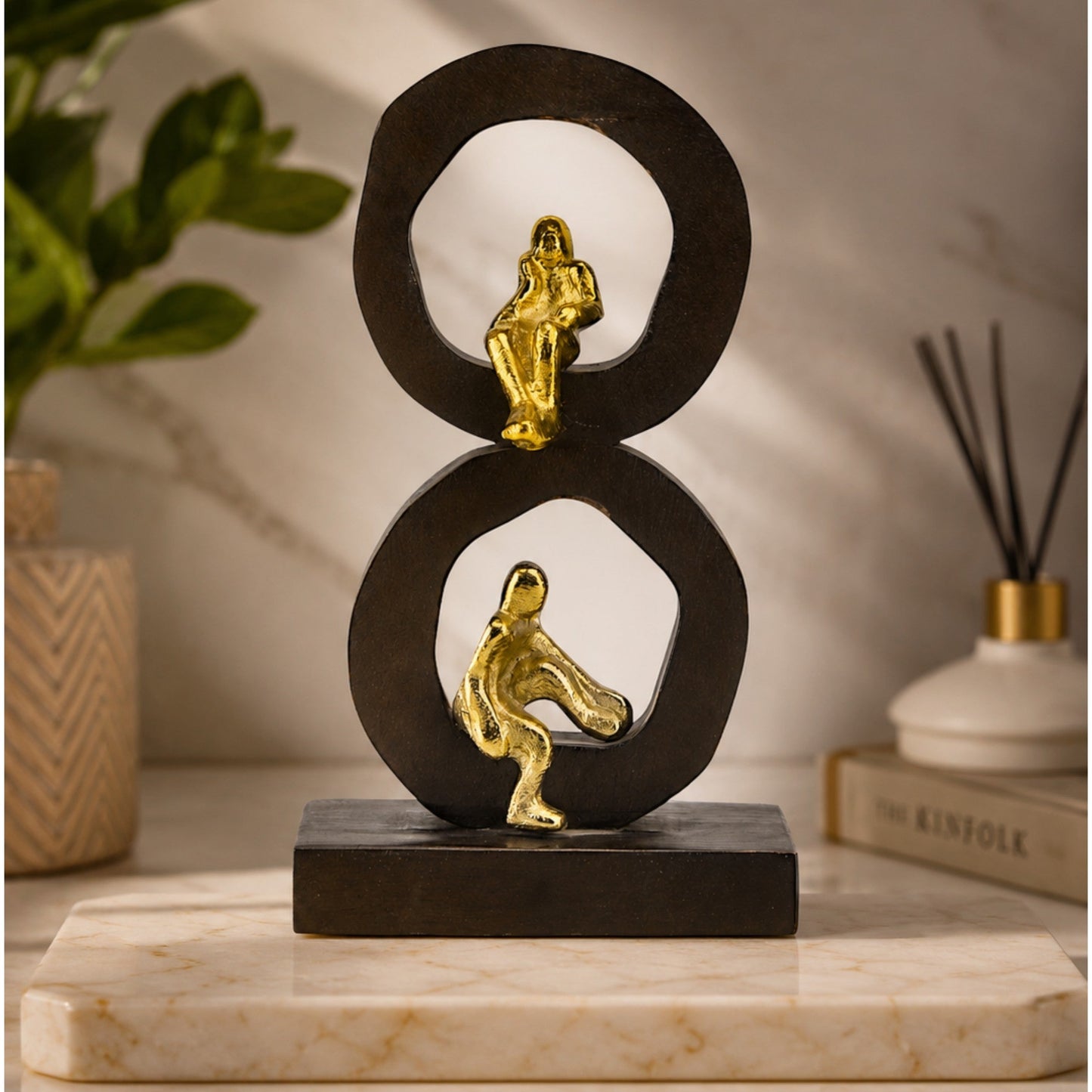 Golden Harmony: Handcrafted Aluminium Mini Human Sitting Sculpture on Wood-Designed Base