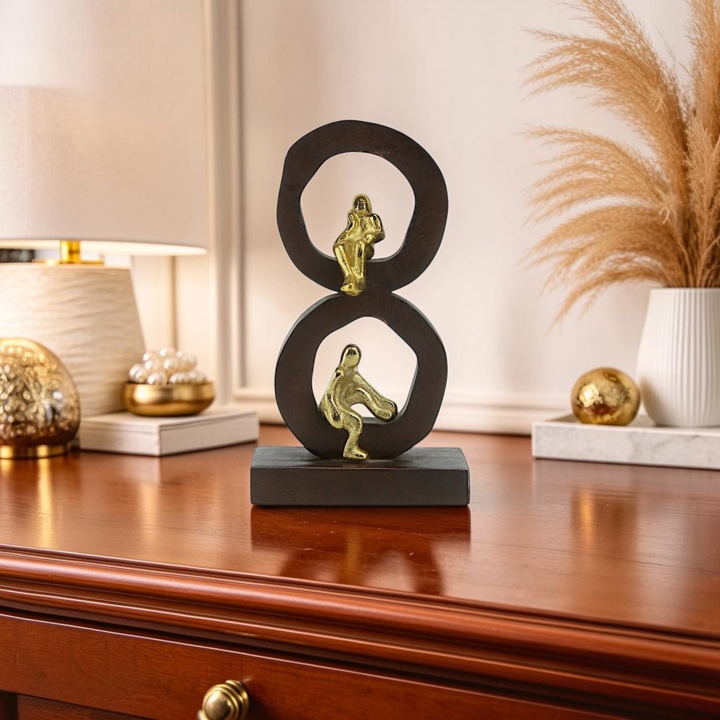Golden Harmony: Handcrafted Aluminium Mini Human Sitting Sculpture on Wood-Designed Base