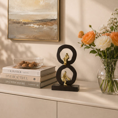 Golden Harmony: Handcrafted Aluminium Mini Human Sitting Sculpture on Wood-Designed Base